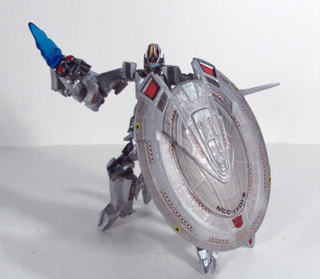 Illustration for article titled There's an Autobot hidden in this Custom Enterprise/Transformers toy